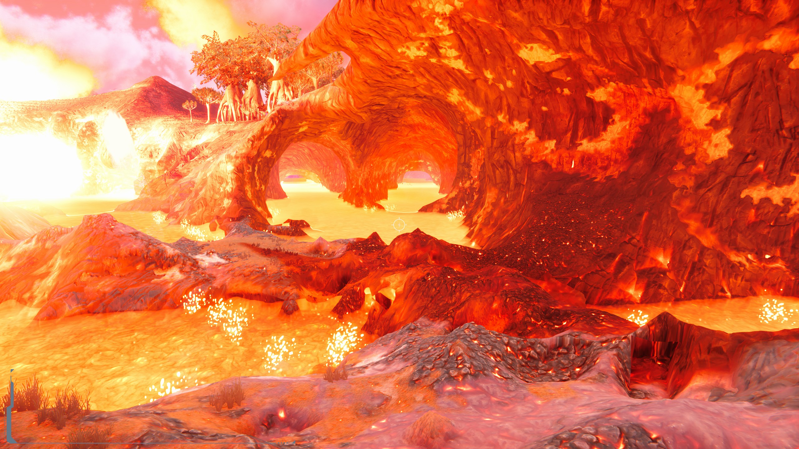 Bright orange lava flows beneath rocky arches in a volcanic landscape.